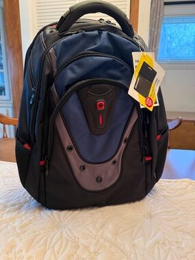 SwissGear Navy Blue, Black and Gray Backpack with Red Accents unisex